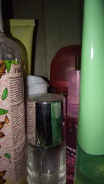 Close-up of wine bottles on table