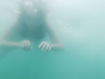 Man swimming in sea