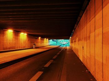 Illuminated tunnel at railroad station