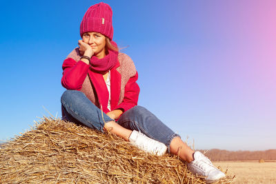 The concept of livestyle outdoor in autumn. close up of a young woman student 