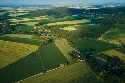 Aerial view of countryside area with village and mountains