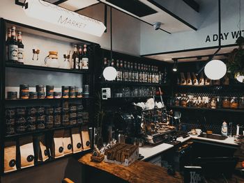 Low angle view of bottles on display at restaurant