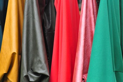Clothes hanging on curtain