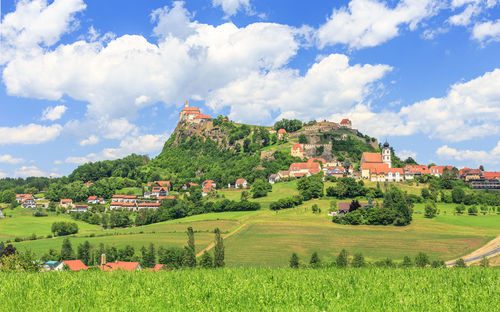 Panoramic shot of agricultural field against sky