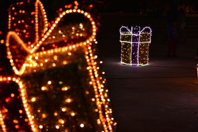 Illuminated christmas tree at night
