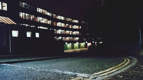 Illuminated buildings in city at night