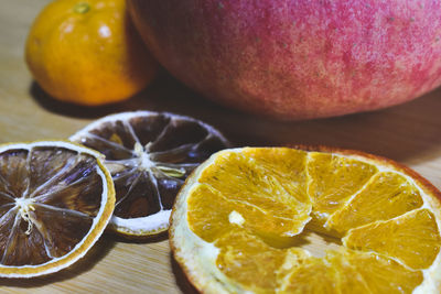 Close-up of oranges on table