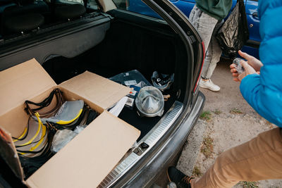 High angle view of people on car