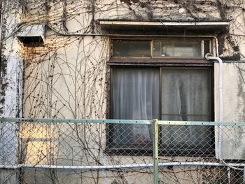 Closed window of old building