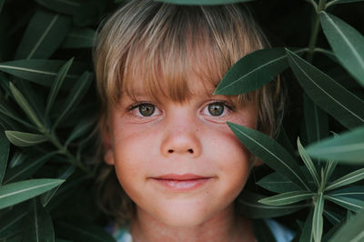 Portrait face of candid happy little kid boy of five years old with problem allergic skin