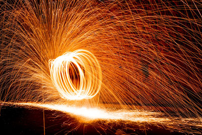 Firework display at night