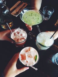High angle view of people having food on table