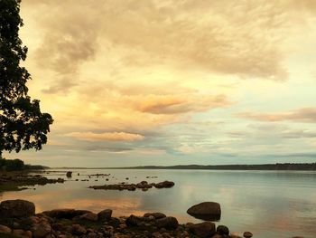 Scenic view of sea against sky during sunset