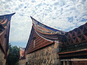 Low angle view of traditional building against sky