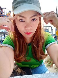 Portrait of beautiful woman wearing hat