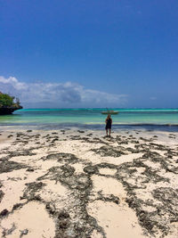 Happy woman on the mythical pingwe beach