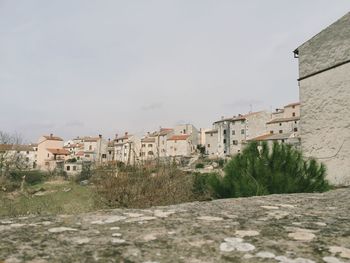 View of houses against sky