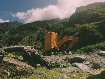 Panoramic view of rocks and mountains against sky