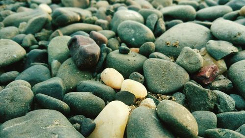 Full frame shot of pebbles on beach