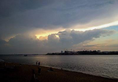 View of dramatic sky over sea during sunset