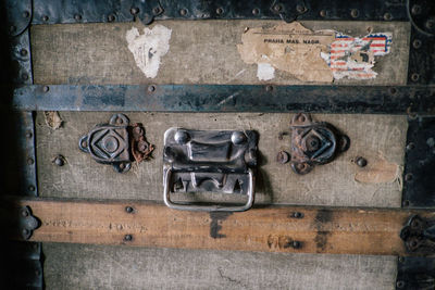 Close-up of text on old door