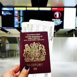 Close-up of cropped hand holding text