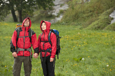 Couple hiking in the rain in england