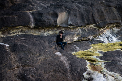 Full length of man praying outdoors