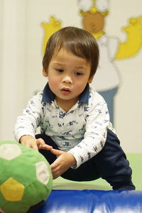 Portrait of cute girl playing at home