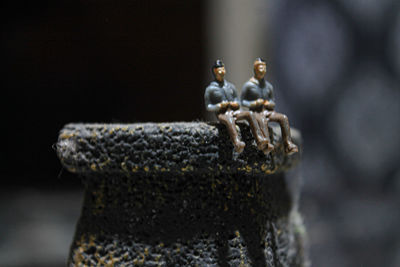 Close-up of figurine on table