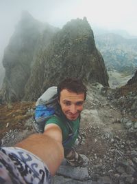 Man standing on cliff