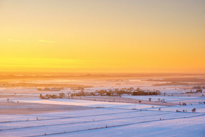 Beautiful wintry sunset over a rural landscape