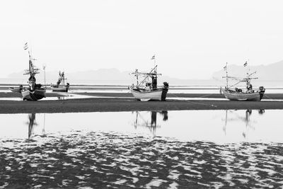 View of fishing boats in harbor