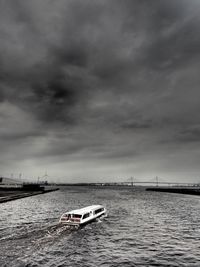 Sailboat on sea against sky
