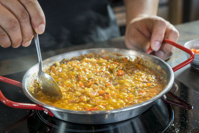 Close-up of person preparing food