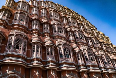 Low angle view of ornate building against sky