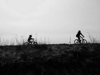 People walking on landscape