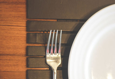 Close-up of lamp against wall