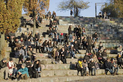 Group of people sitting outdoors