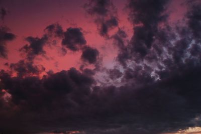 Low angle view of dramatic sky at sunset