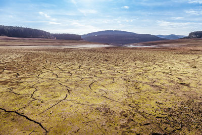 Scenic view of land against sky