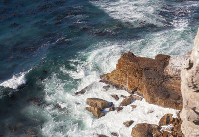 View to azure cold water of atlantic ocean from the top point of cape of good hope