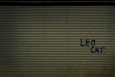 Full frame shot of text on wall