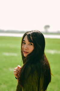 Portrait of a smiling young woman