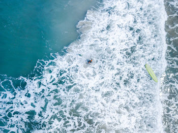 High angle view of person swimming in sea