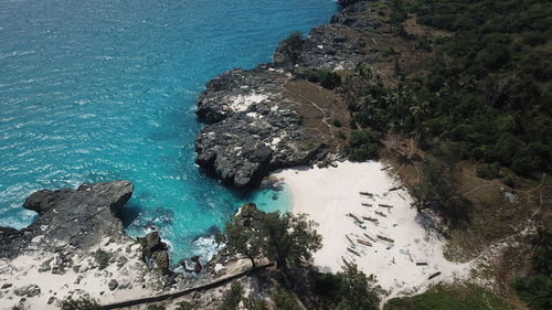 High angle view of rock formation in sea