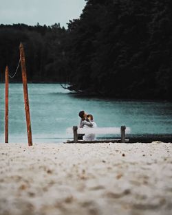 Couple romancing at beach