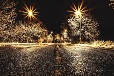 Illuminated street light at night