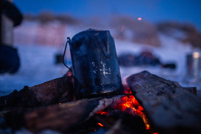 Close-up of fire on log