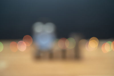 Defocused image of illuminated lights at night